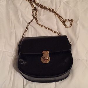 Black mini cross body bag.